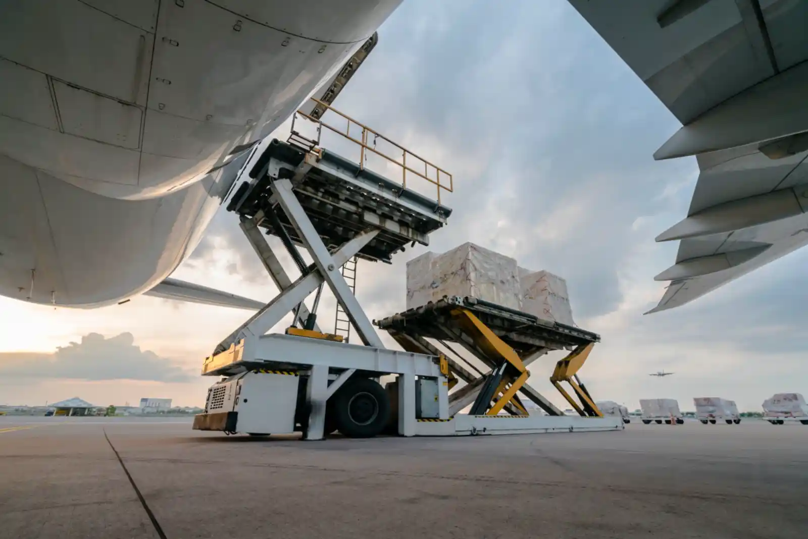 Air cargo ramp with aircraft and ground-handling equipment