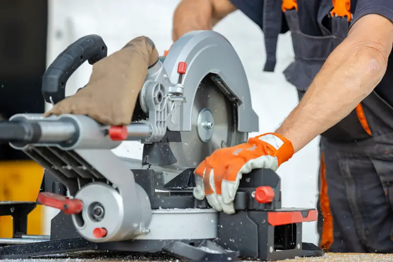 Worker cutting material, generating respirable dust
