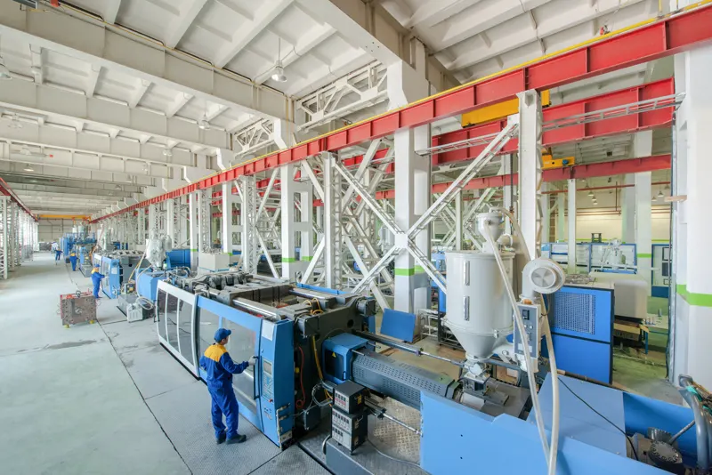 Injection molding machines on a manufacturing floor