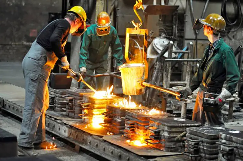 Molten metal being tapped in a melt shop