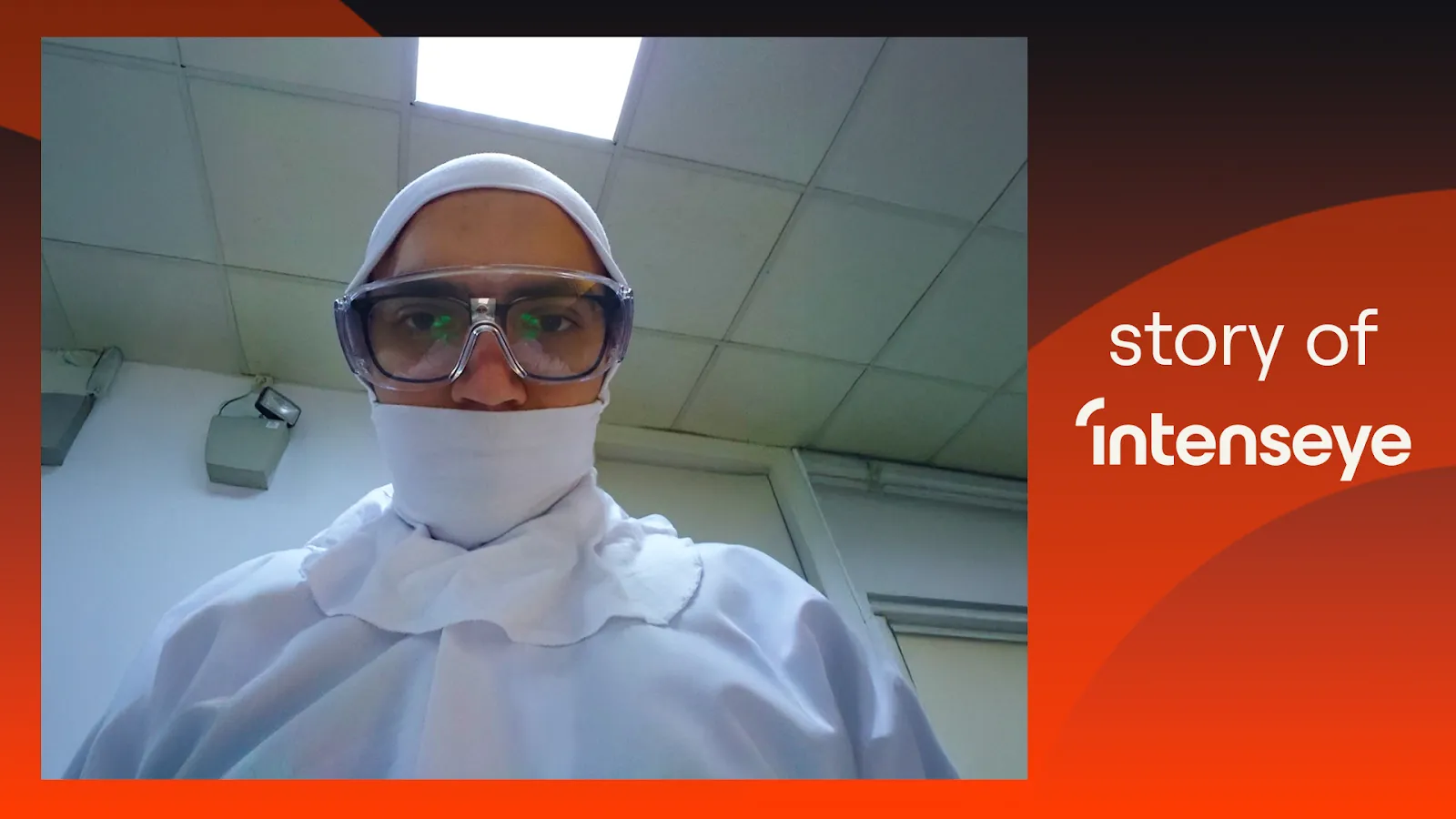Sercan Esen in white food-safety overalls, goggles and a face cover on an ice cream production floor