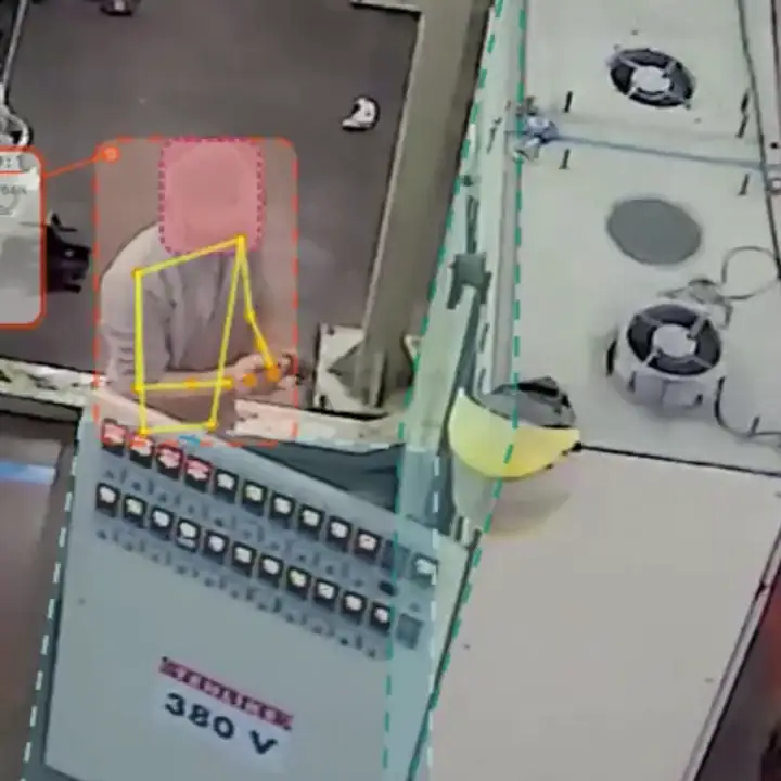 Anonymized worker at a 380 V electrical cabinet inside a dashed restricted-zone overlay